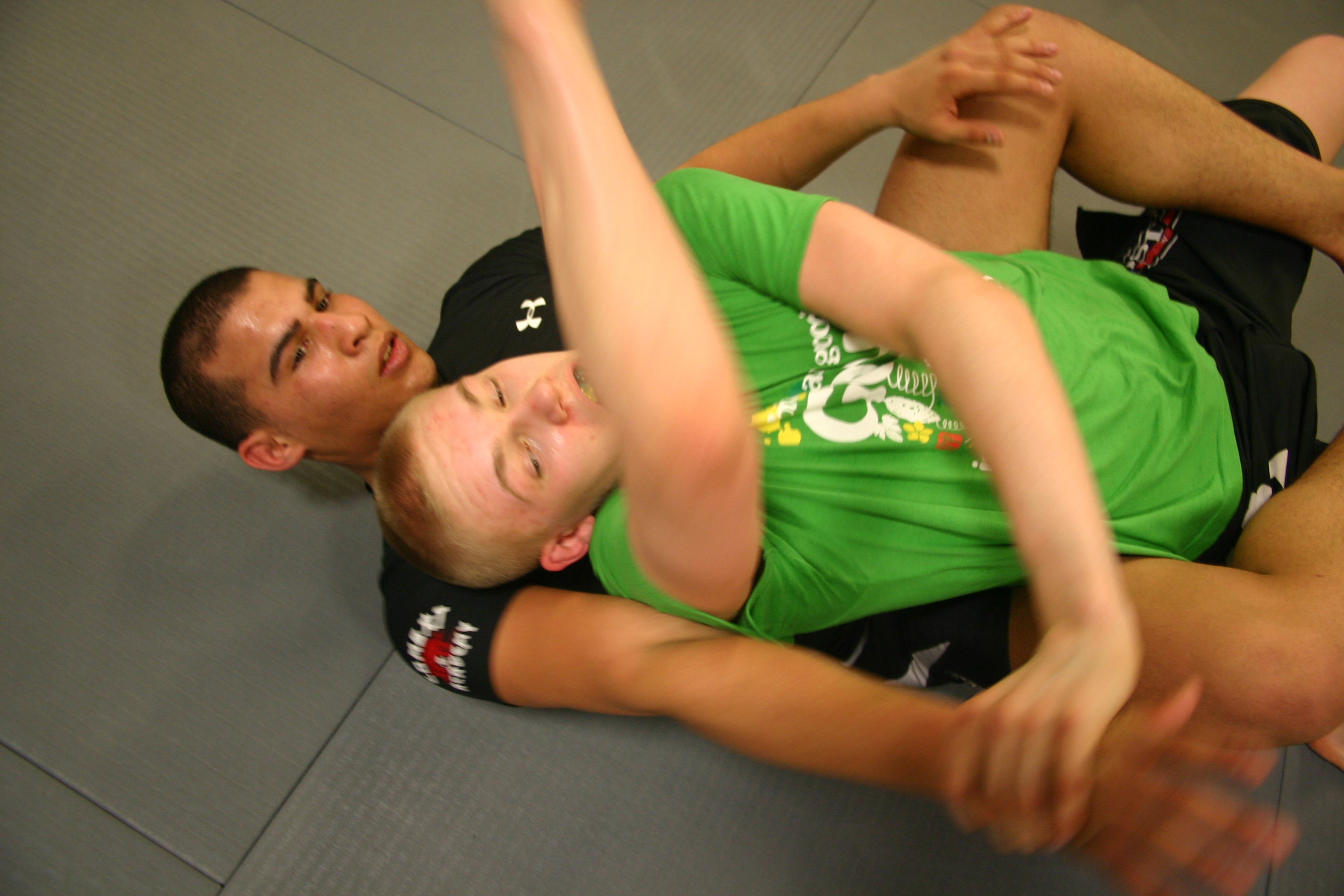 Defending Against the Rear Naked Choke and the Front Headlock – Effective  Self Defense